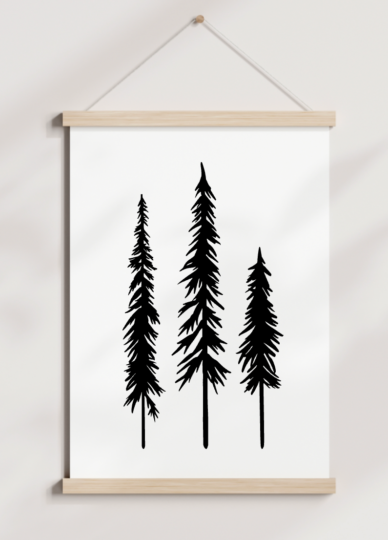 A picture of three trees hanging on a wall