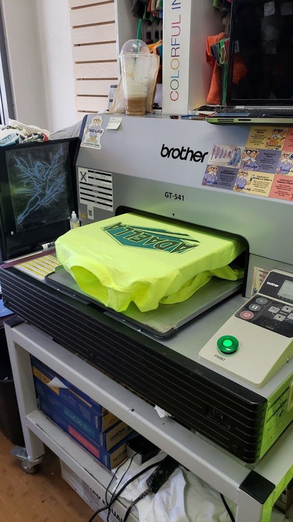 T-Shirt Is Being Printed on A Brother Printer — Tempe, AZ — Big Stitch Embroidery
