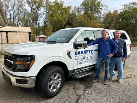 Roofing Specialists — Men Standing Behind Truck in Canton, MI Roofing Specialists — Men Standing Behind Truck in Canton, MI