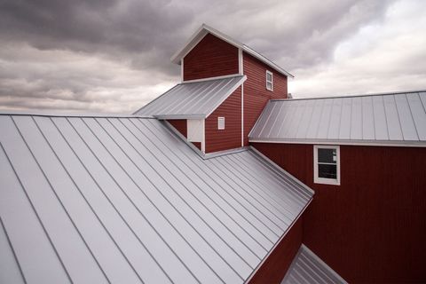Commercial Roofing Maintenance — Metal Roofs on School in Canton, MI