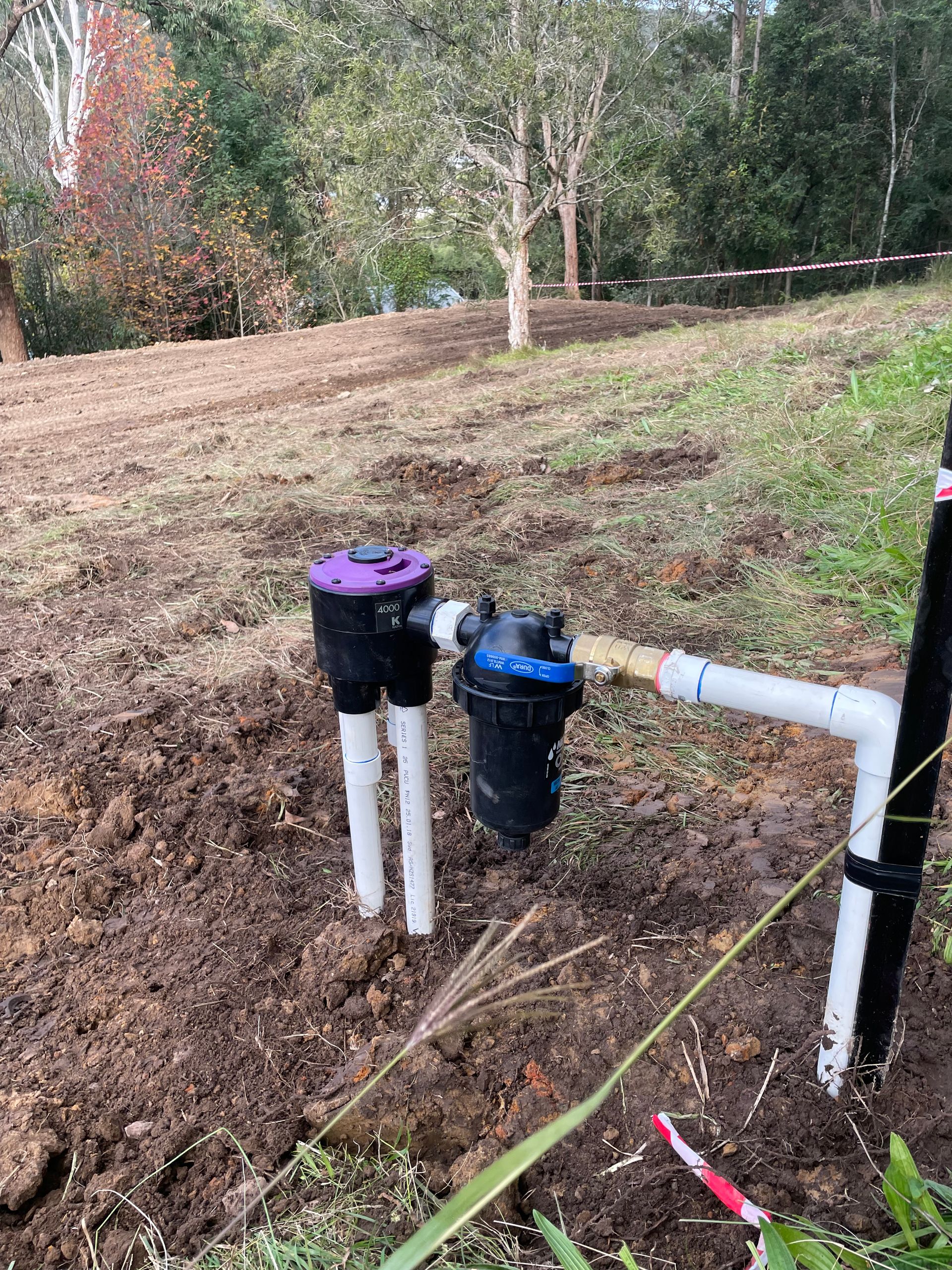 Underground septic system installation by a leading septic tank manufacturer in a rural setting.