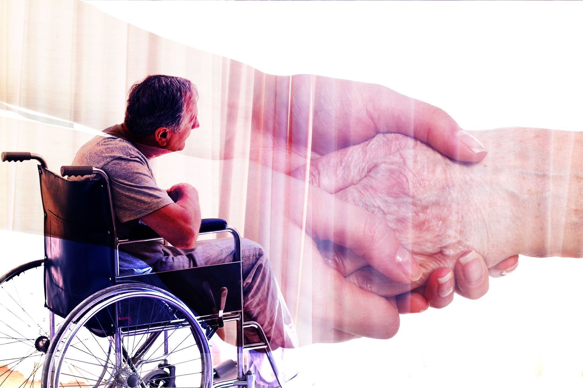 A man in a wheelchair is shaking hands with another person.