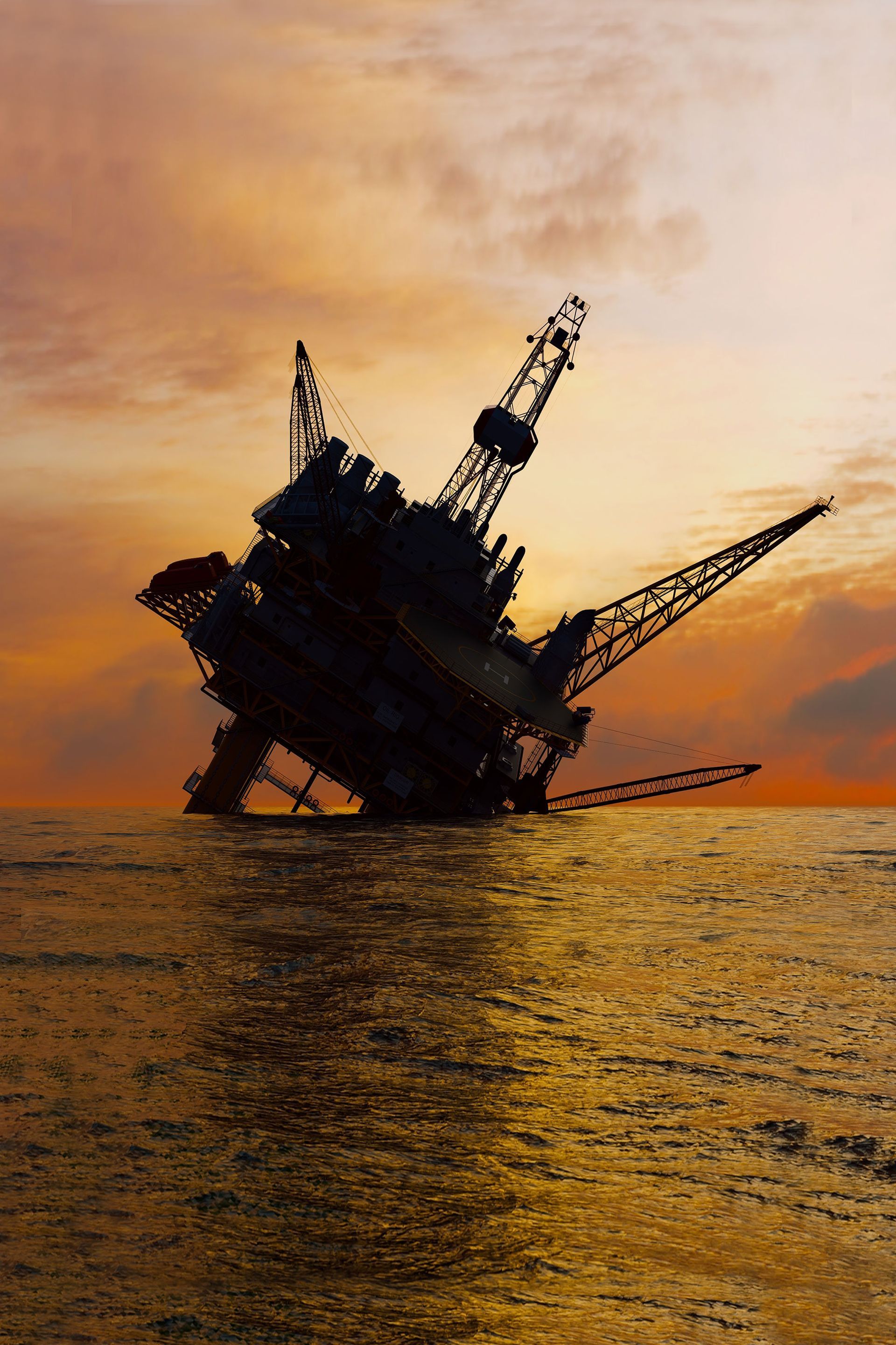 An oil rig in the middle of the ocean at sunset.