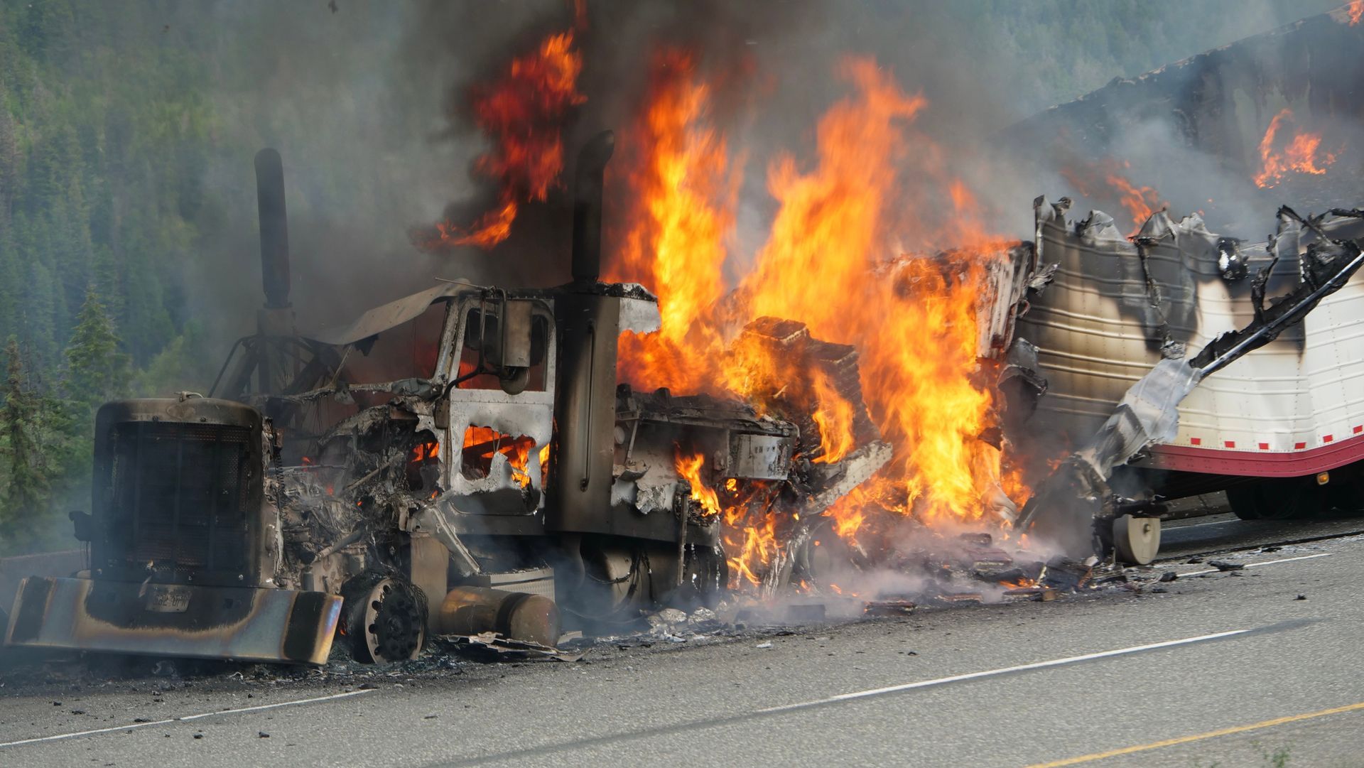 A semi truck on fire after an accident