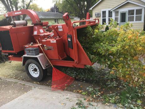 a large wood chipper, tree trimming minneapolis