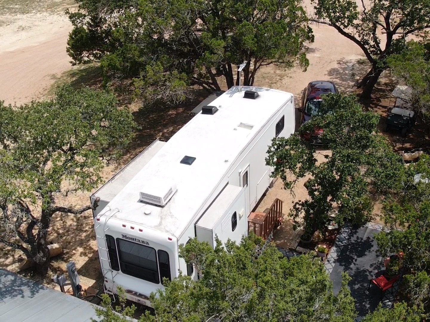 Quiet country living at Oak Meadows Long Term RV Park, nestled in mature Oak and Cedar trees