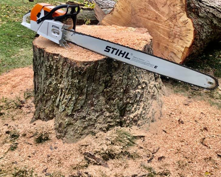 Man Operate Stump Grinder — Hilliard, OH — Central Ohio Tree Trimming Service