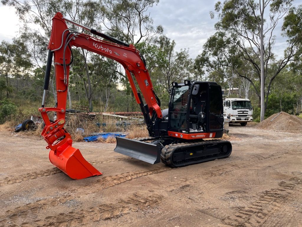 A Bulldozer is Moving Dirt on a Construction Site — Eddy’s Excavations & Bobcat Hire In Boyne Valley, QLD