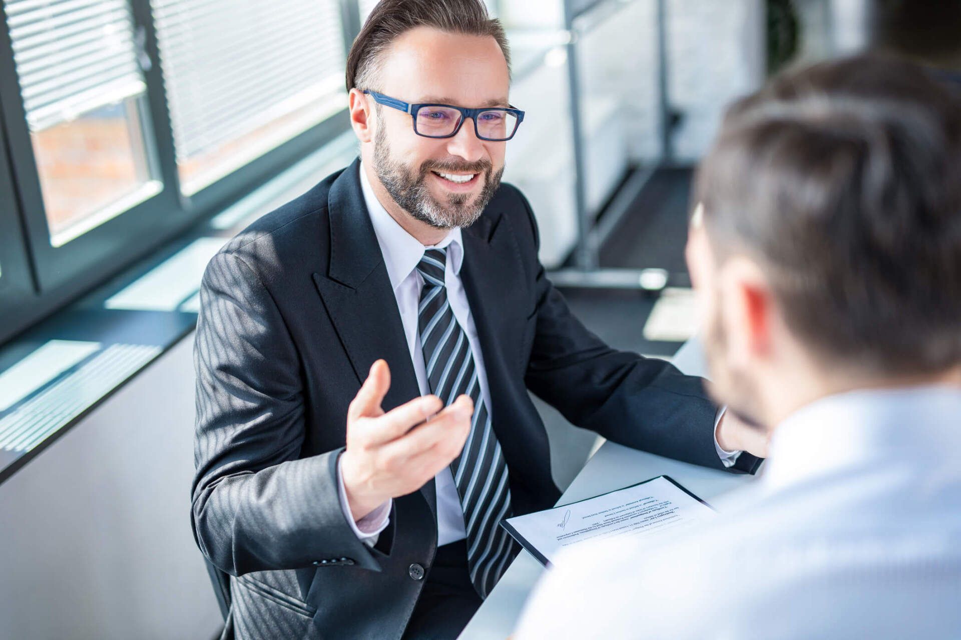 Business People Negotiating a Contract