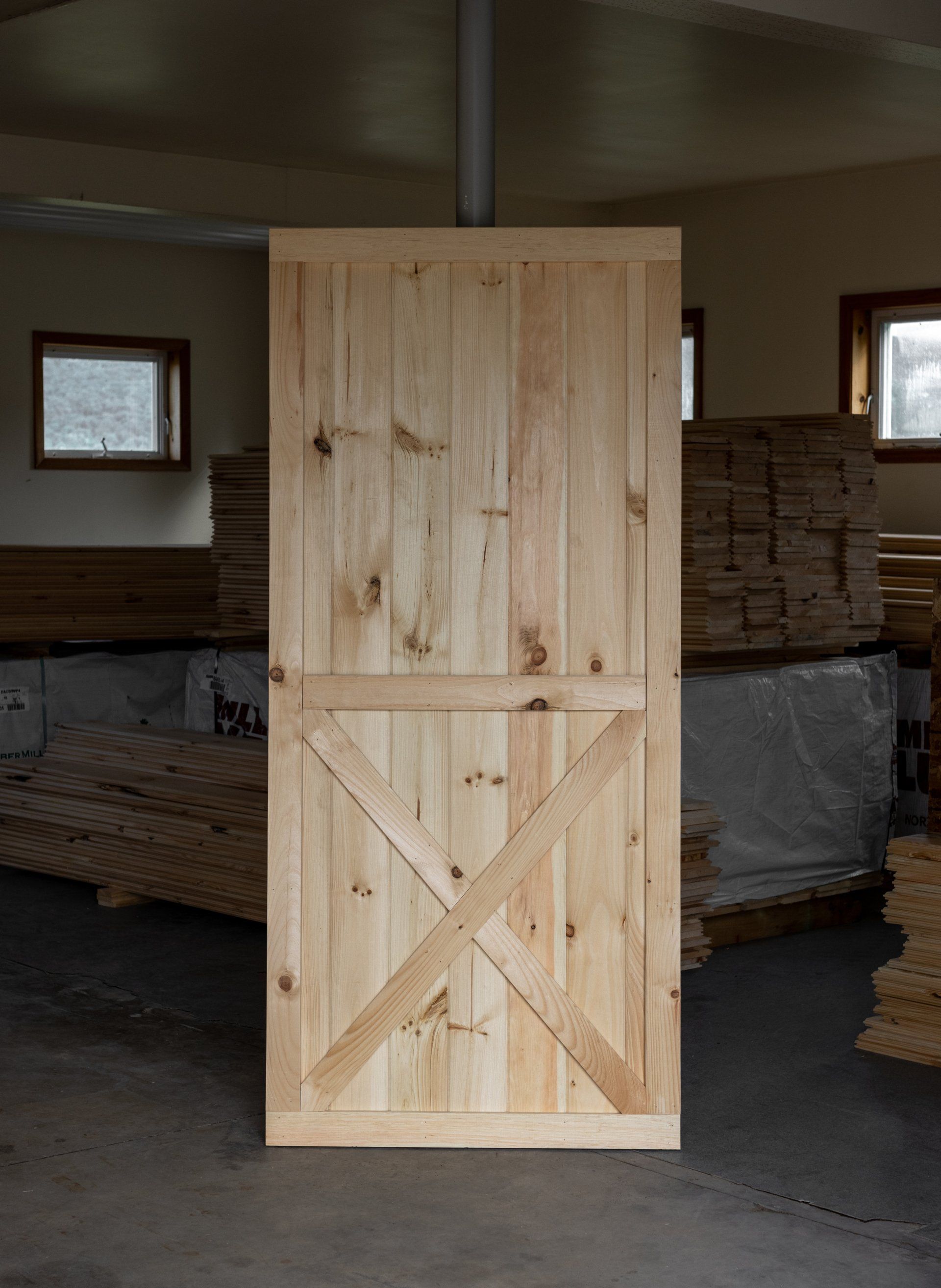 Affordable half-x-brace barn doors with kiln fired pine  in Boalsburg