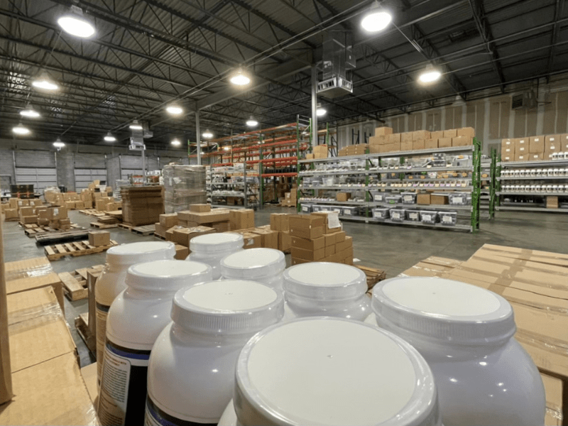 A warehouse filled with lots of jars and boxes.