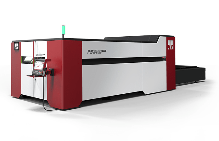 A red and white machine with a green light on top of it.