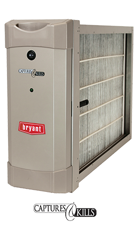 A bryant air purifier is sitting on top of a white surface.