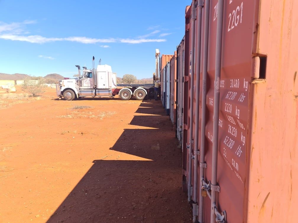 Truck in Front of Shipping Containers — Central Australian Sidelifter Haulage In Braitling NT