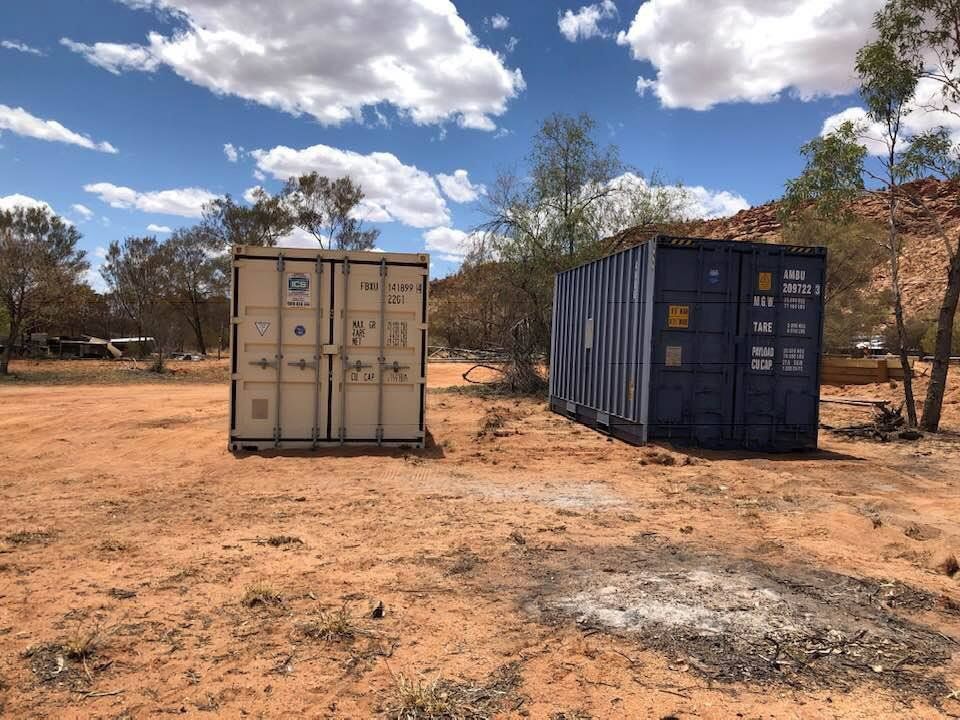 Grey And Blue Containers — Central Australian Sidelifter Haulage In Braitling NT