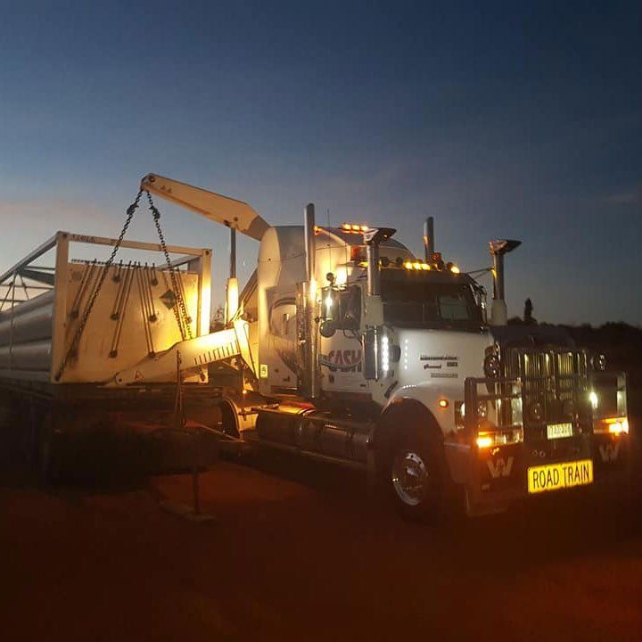 Unloading Truck With Sidelifter — Central Australian Sidelifter Haulage In Braitling NT