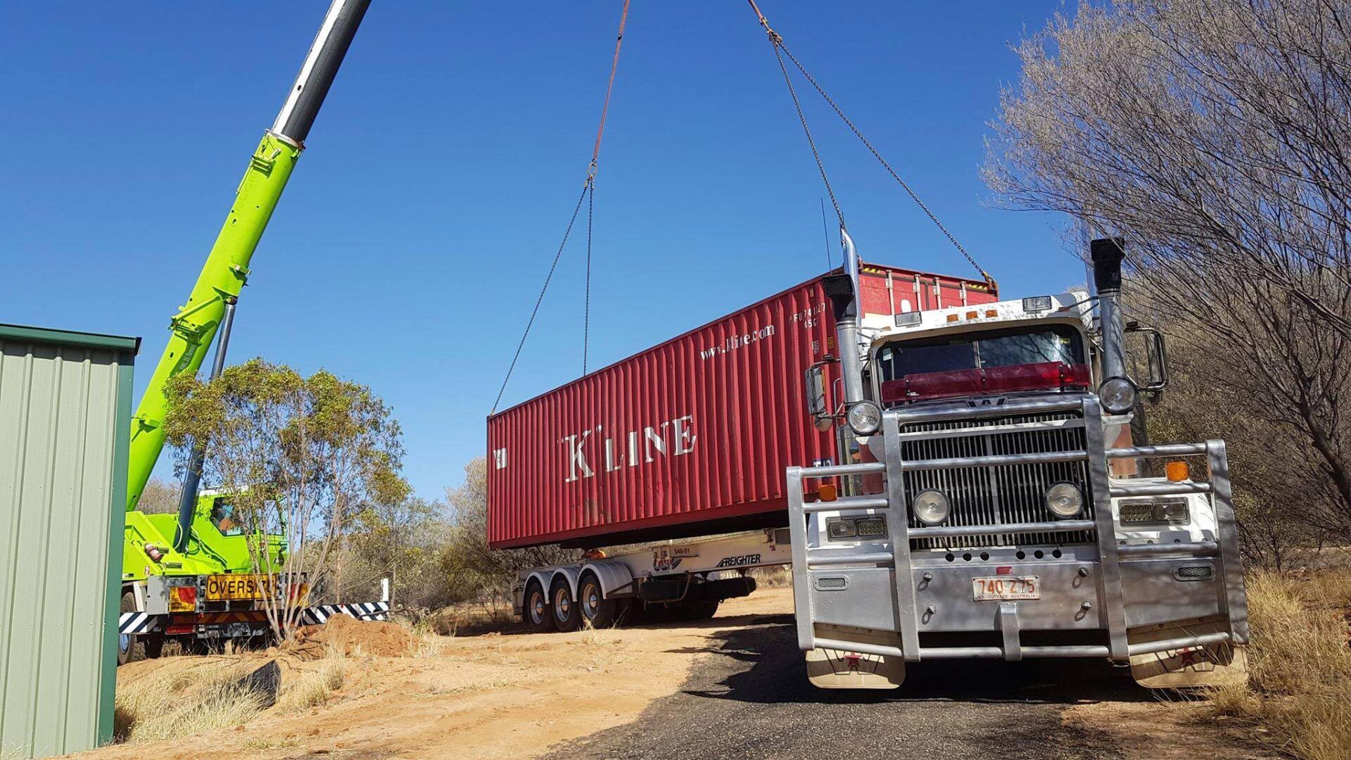 K-Line Red Container Loaded On The Truck — Central Australian Sidelifter Haulage In Braitling NT
