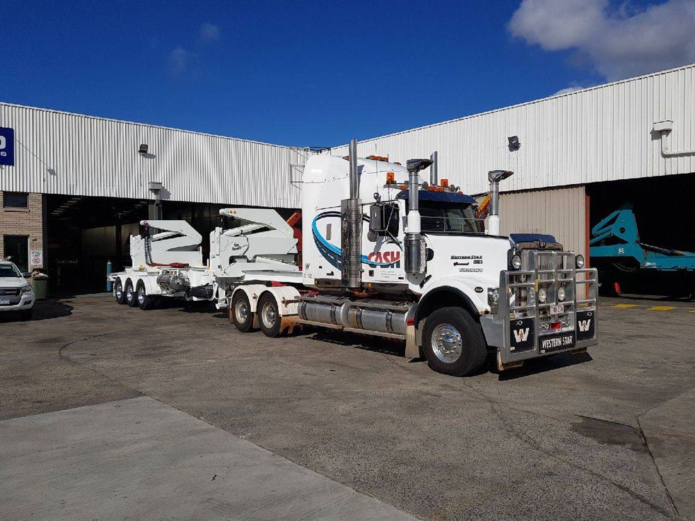 CASH Truck Backed Up To The Warehouse — Central Australian Sidelifter Haulage In Braitling NT