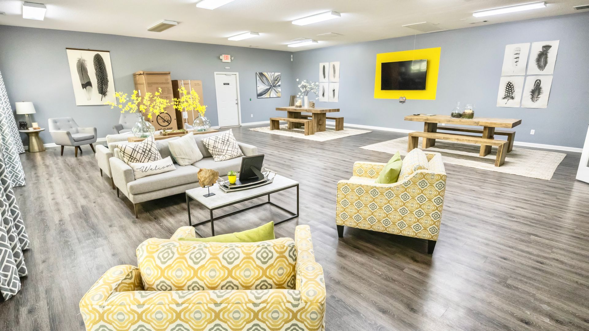 A living room filled with furniture and a flat screen tv.