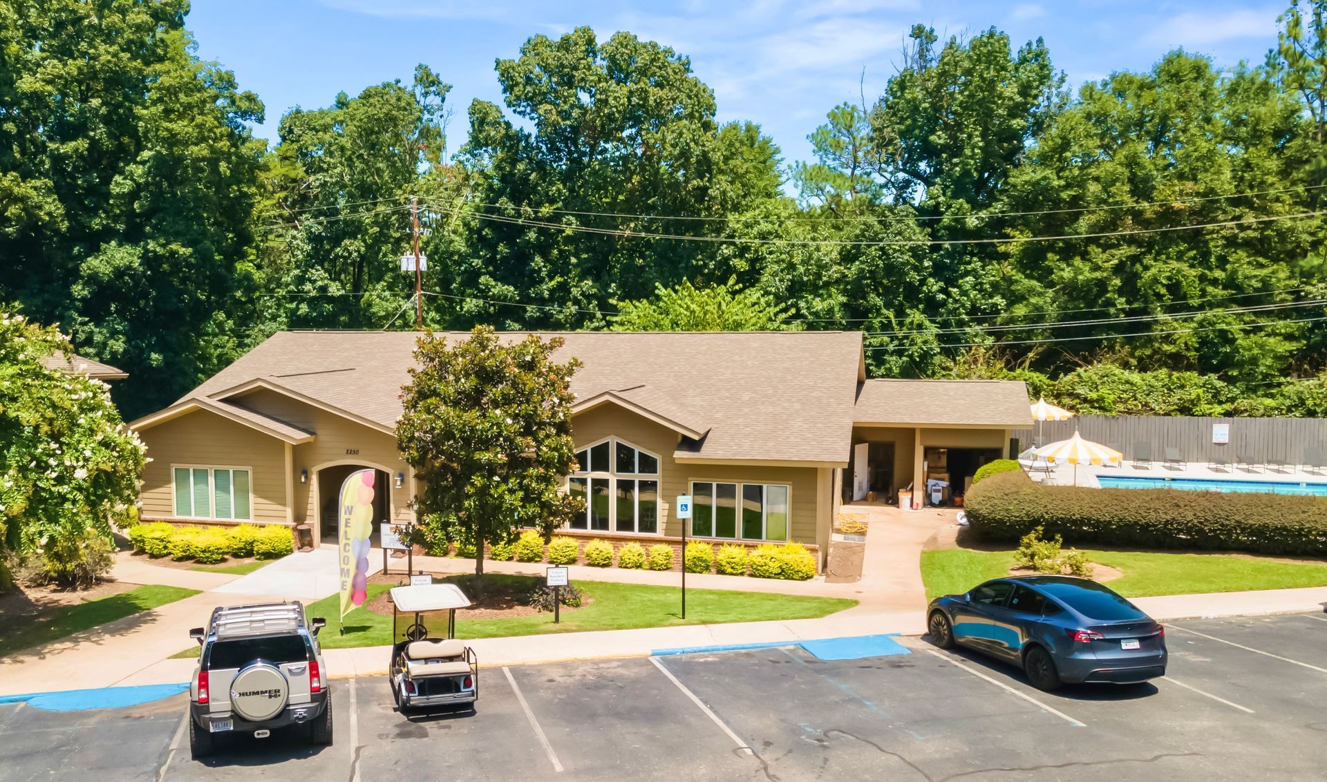 A golf cart is parked in front of a house
