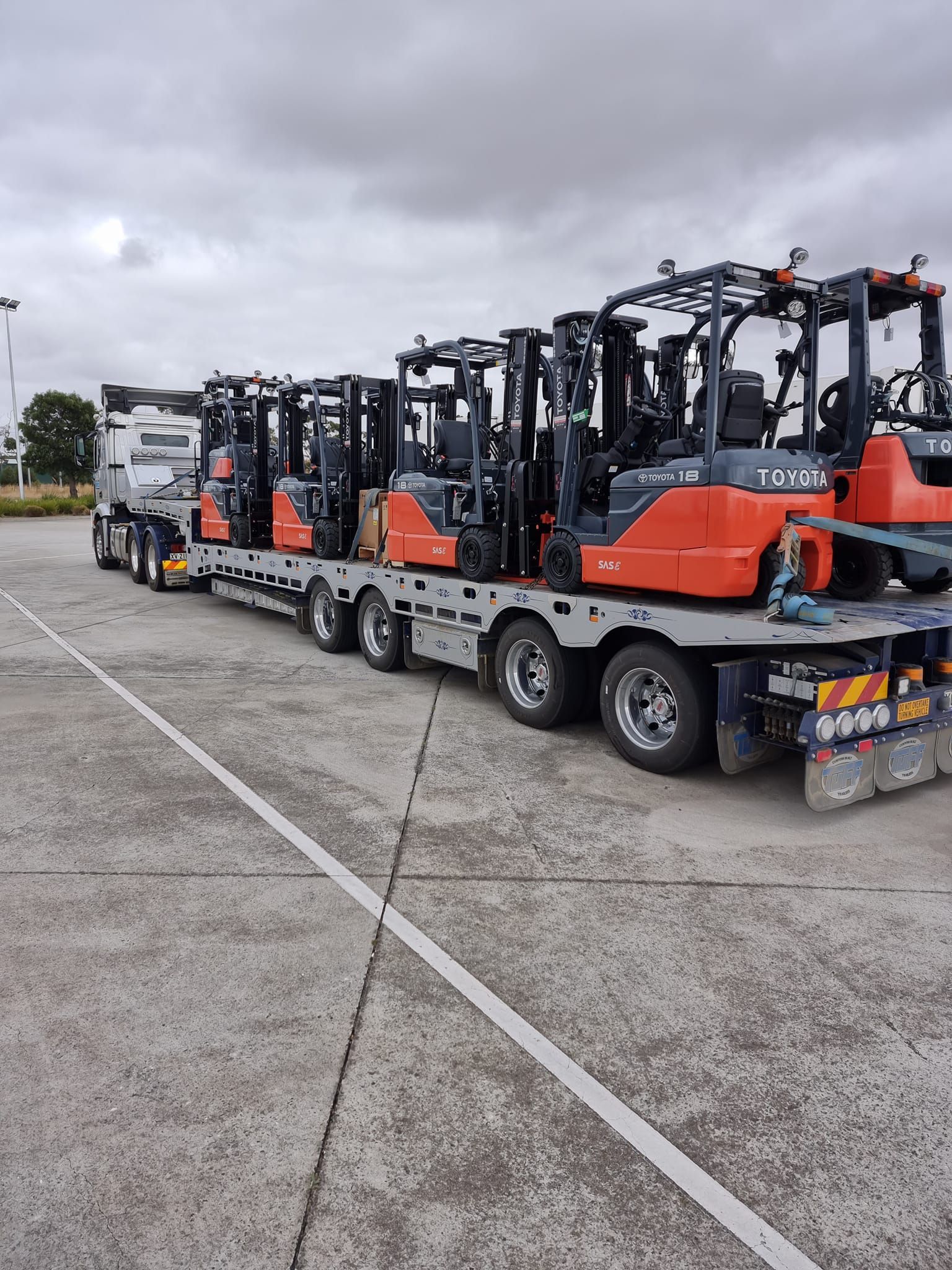 A Truck With Ramps Attached to It is Parked in Front of a Building — Ballarat Supatilt in Ballarat, VIC