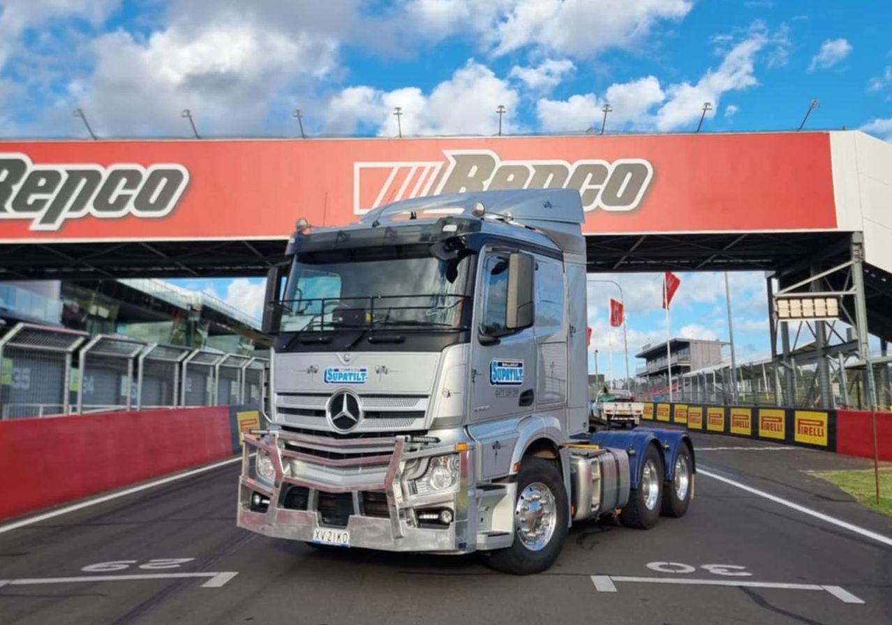 A truck is parked in front of a repco sign on a race track — Ballarat Supatilt in Delacombe, VIC