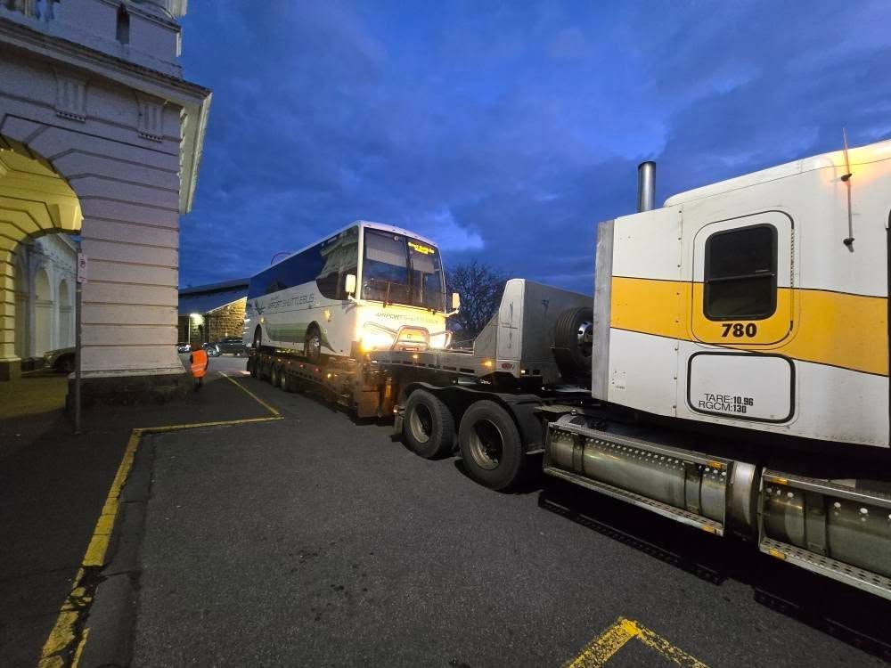 A Tow Truck is Towing a Car on a Flatbed — Ballarat Supatilt in Ballarat, VIC