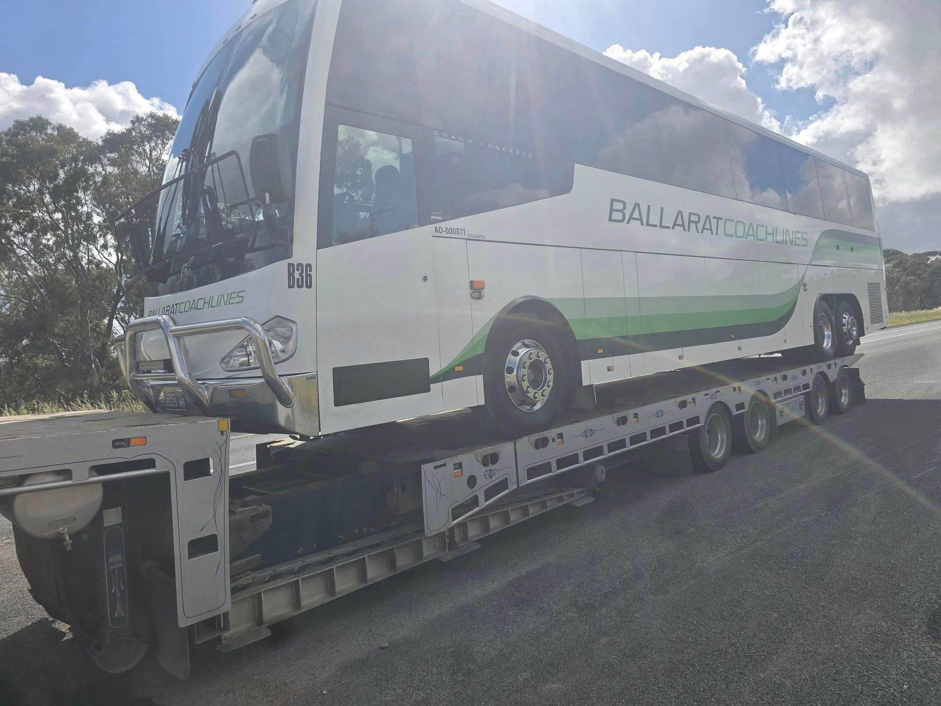 A Car is Being Towed by a Tow Truck on a Highway — Ballarat Supatilt in Bendigo, VIC
