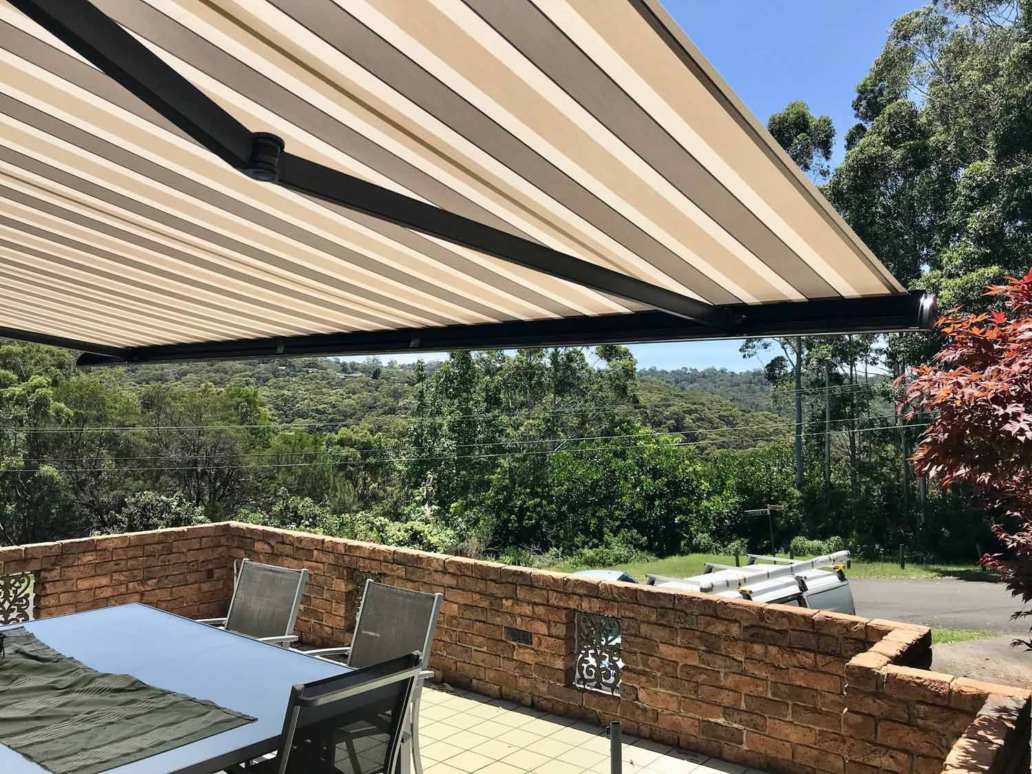 A patio with a table and chairs | Sydney, NSW | Sunmaster Australia