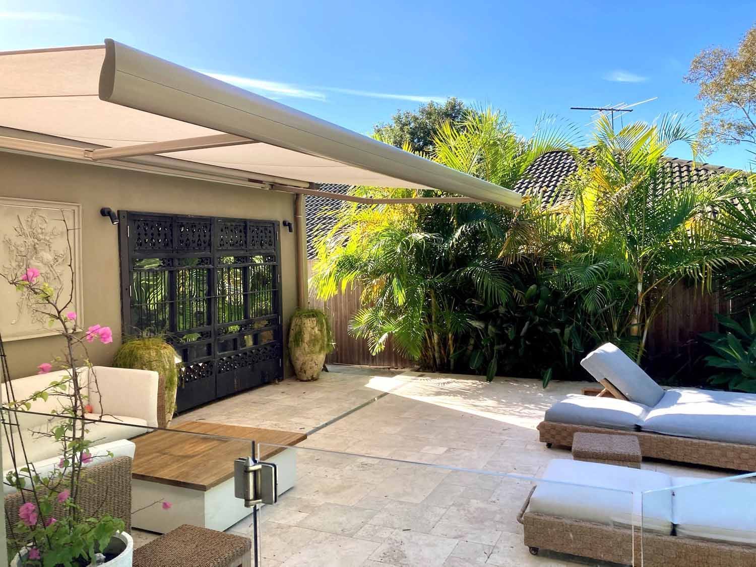 A patio with chairs and a deck chair | Sydney, NSW | Sunmaster Australia