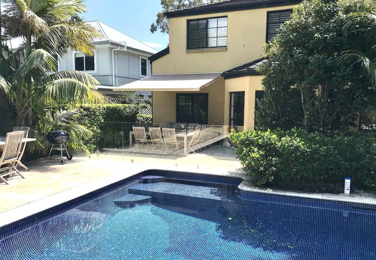 A pool in front of a house | Sydney, NSW | Sunmaster Australia