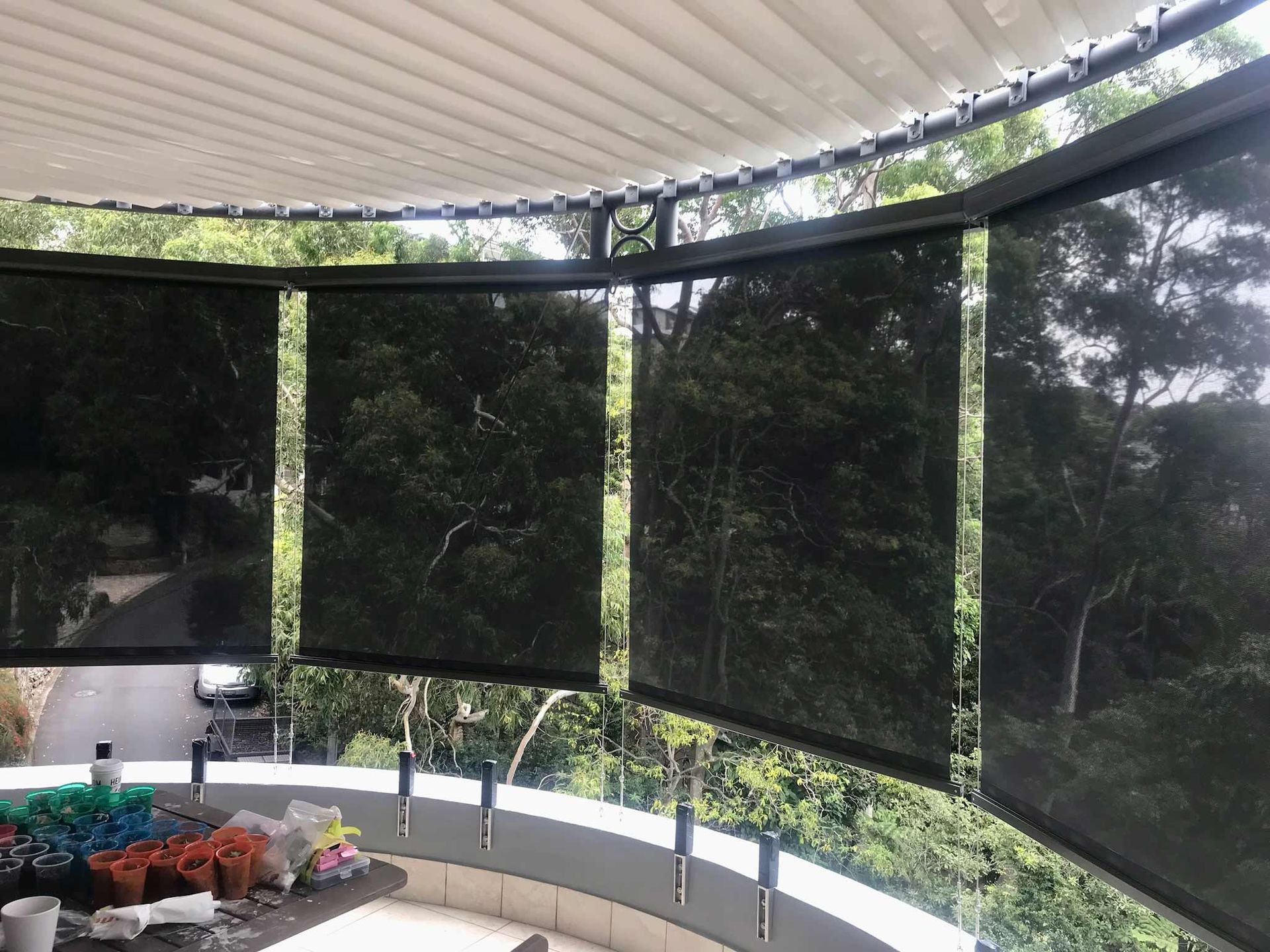 A black screen roll awning on a balcony | Sydney, NSW | Sunmaster Australia