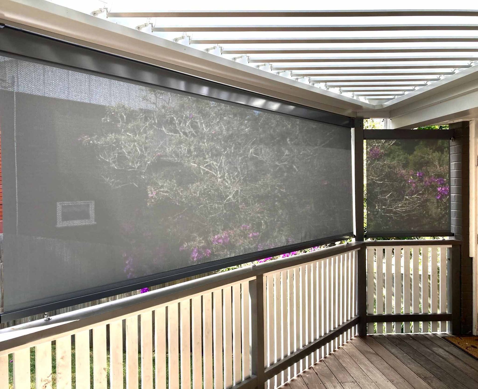 A balcony with black roll screen awning | Sydney, NSW | Sunmaster Australia