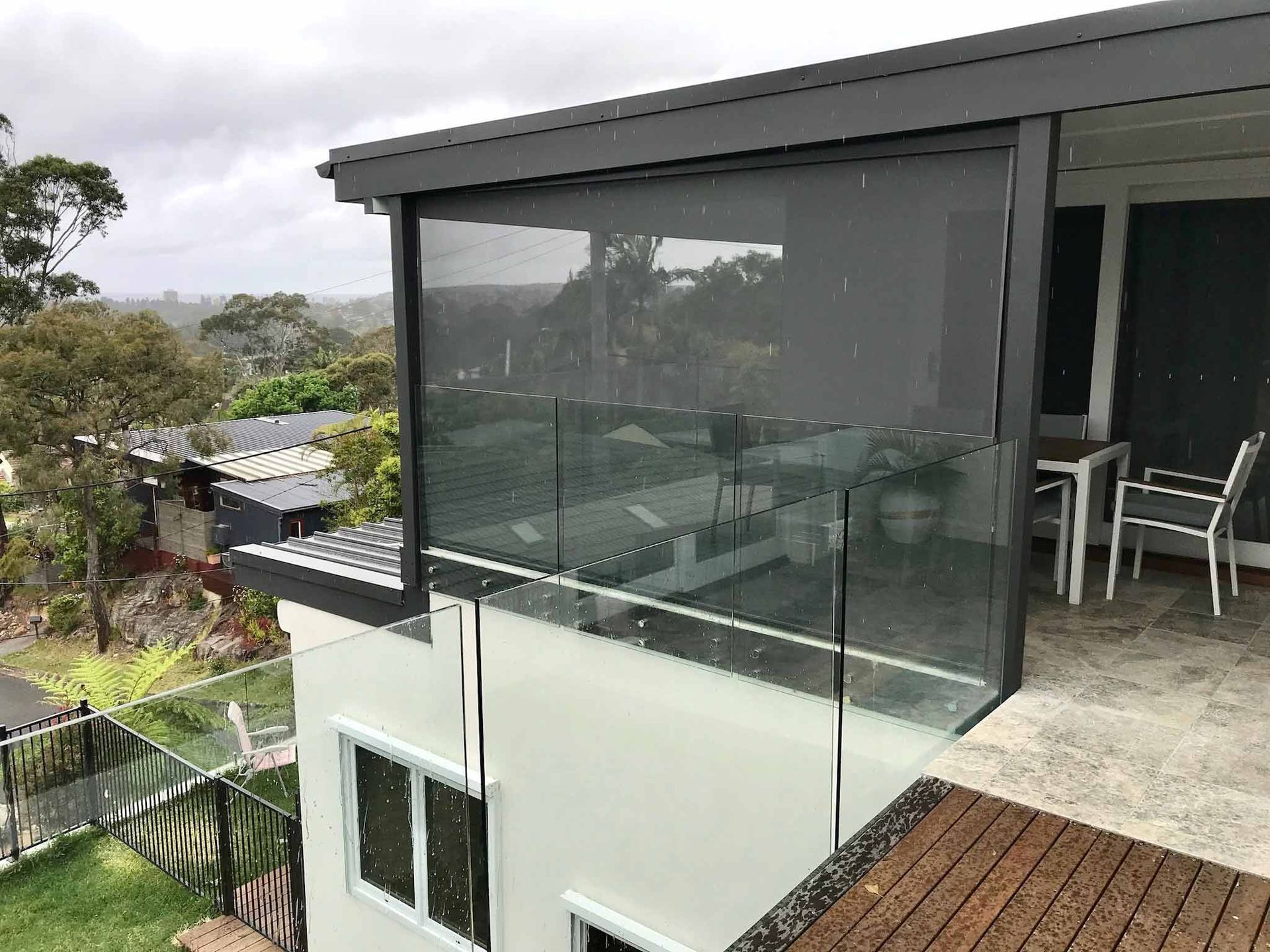 A balcony with glass railing | Sydney, NSW | Sunmaster Australia