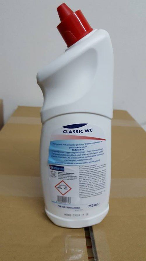 un prodotto per wc di color bianco con tappo rosso