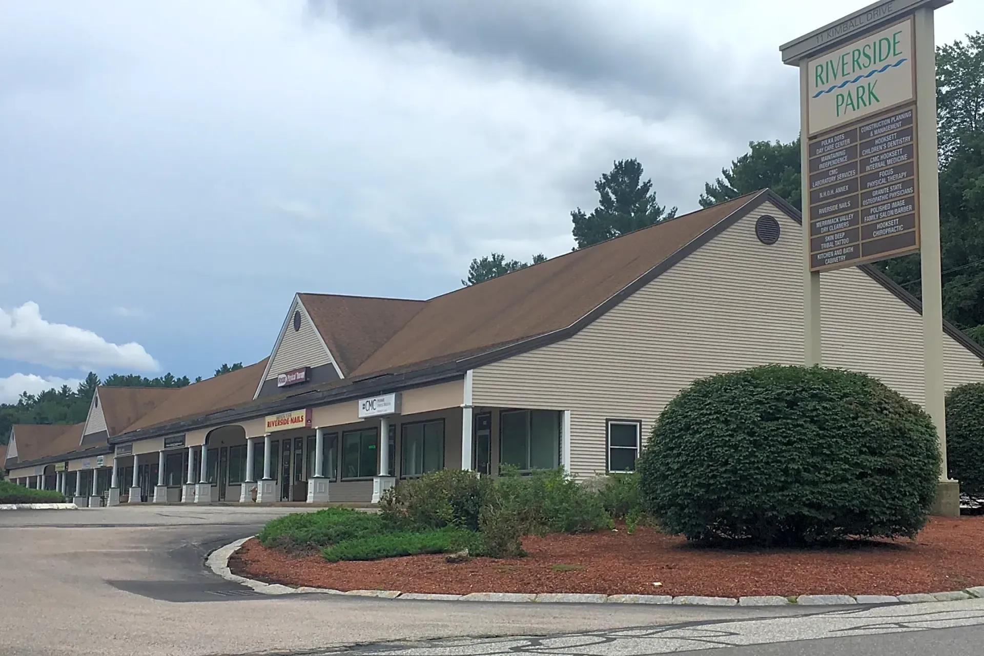 A large building with a sign on the side of it.