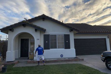 Painter In Front Of The House — Ontario, CA — Elite Painters