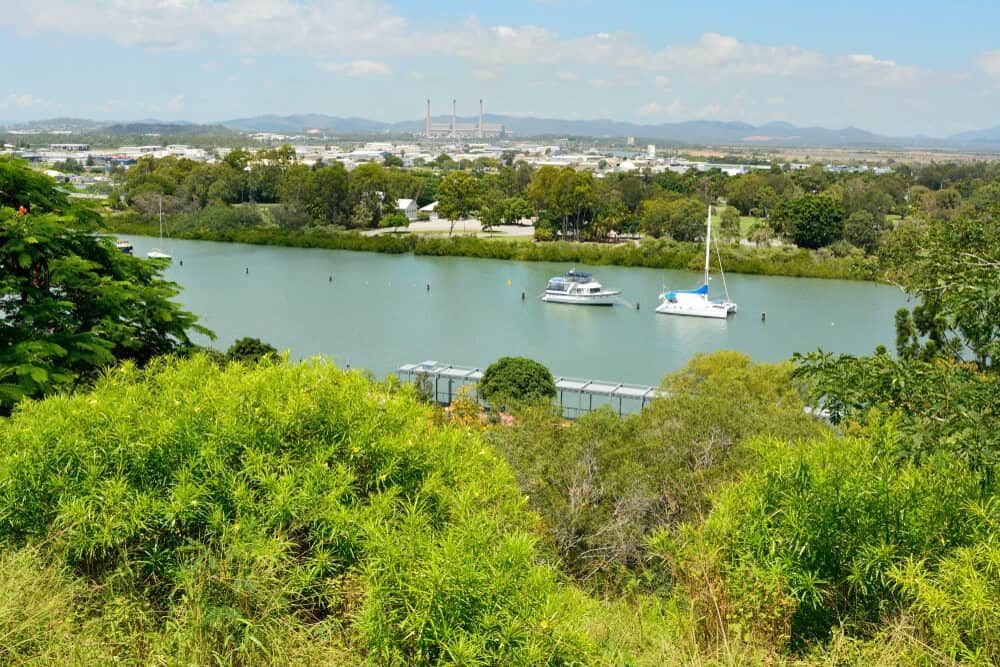 A River With Boats in It and a City in the Background — Calibre Resourcing Solutions in Gladstone, QLD