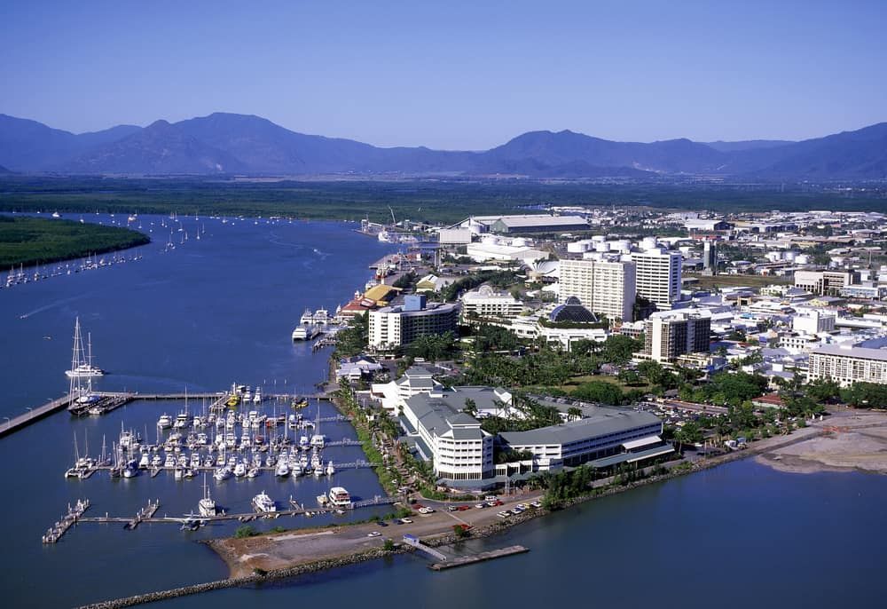 An Aerial View of a City With Mountains in the Background — Calibre Resourcing Solutions in Cairns, QLD
