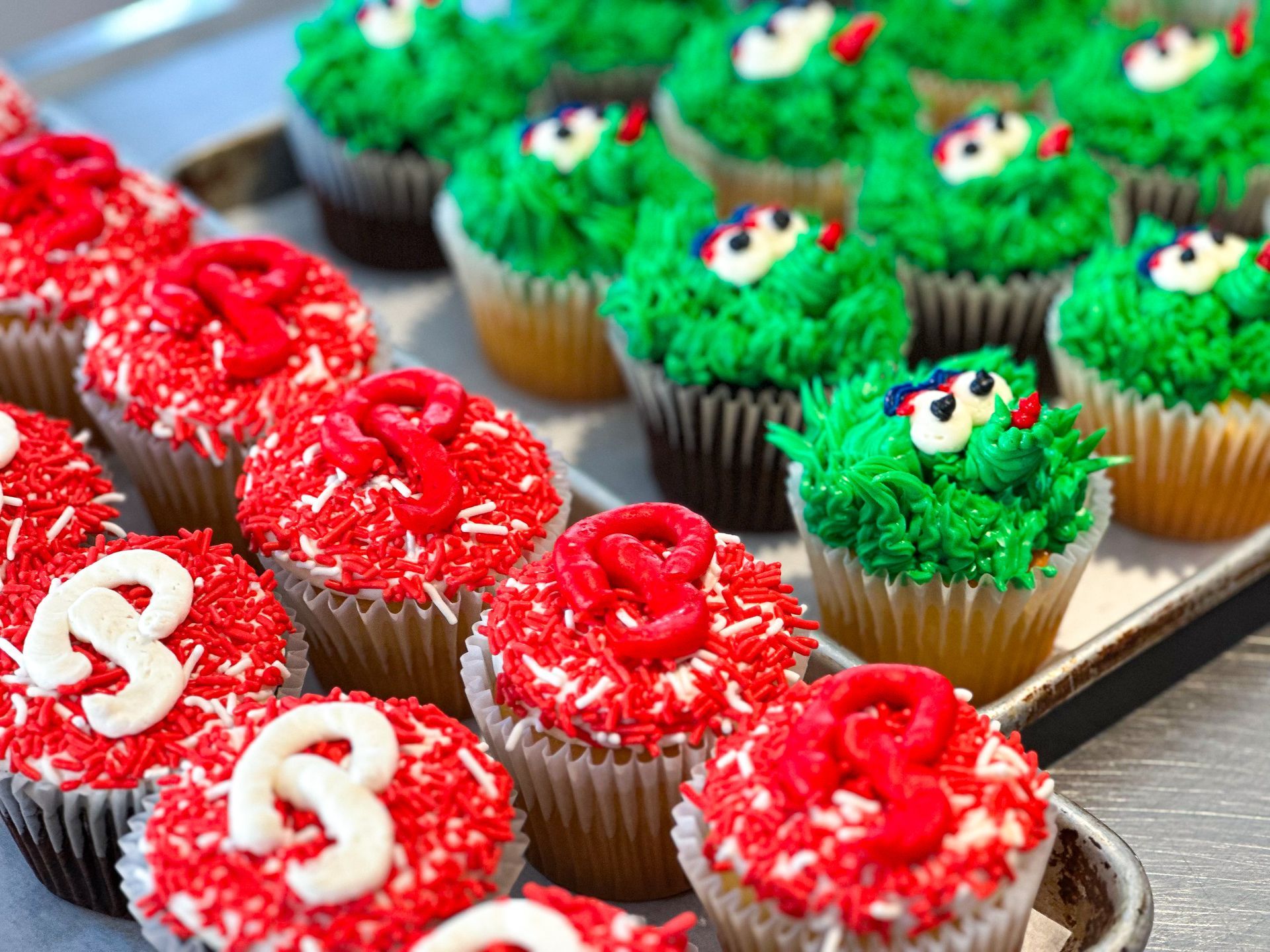 Cupcakes: Red frosting with white 