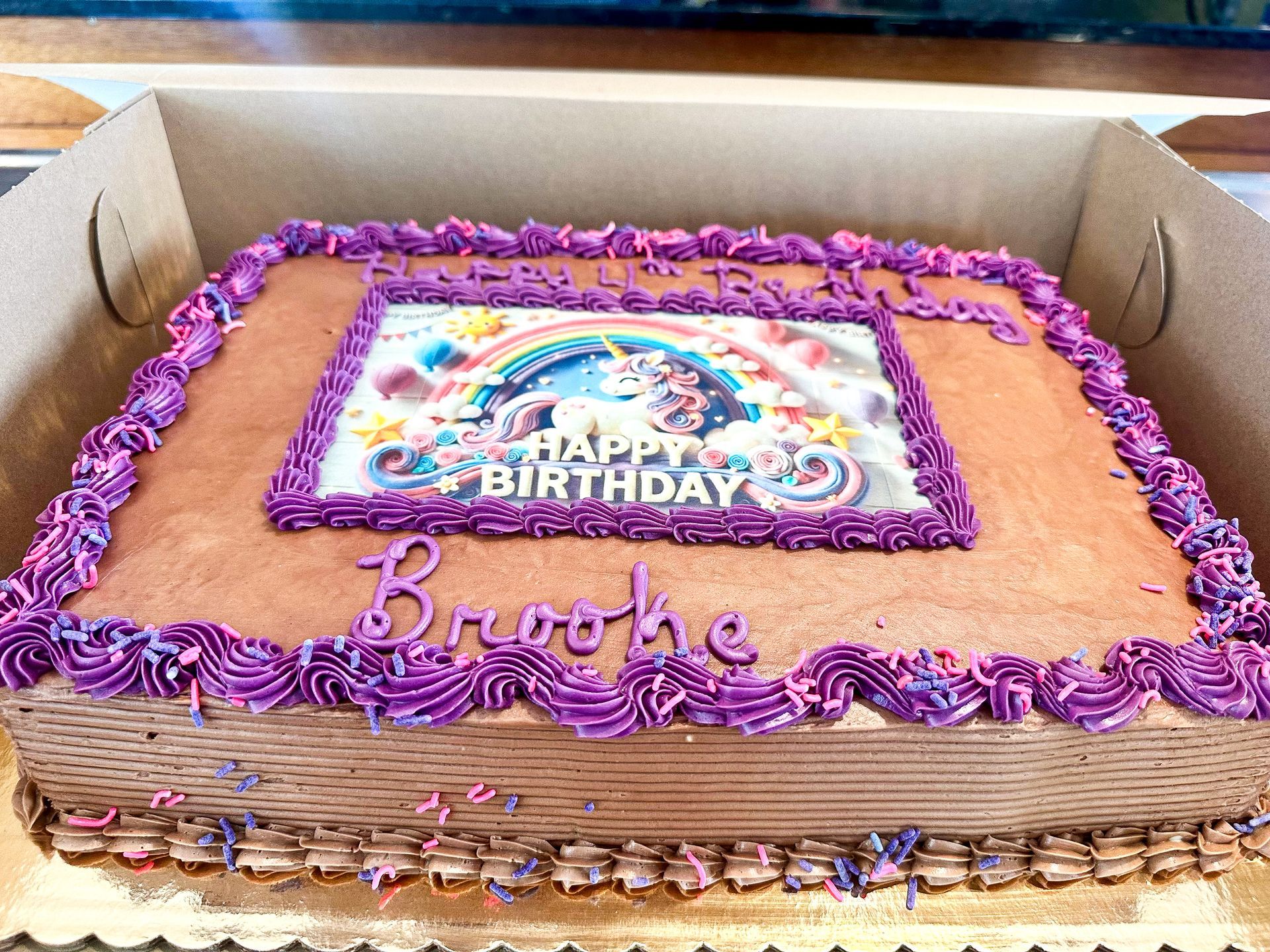 Birthday cake with unicorn graphic, 