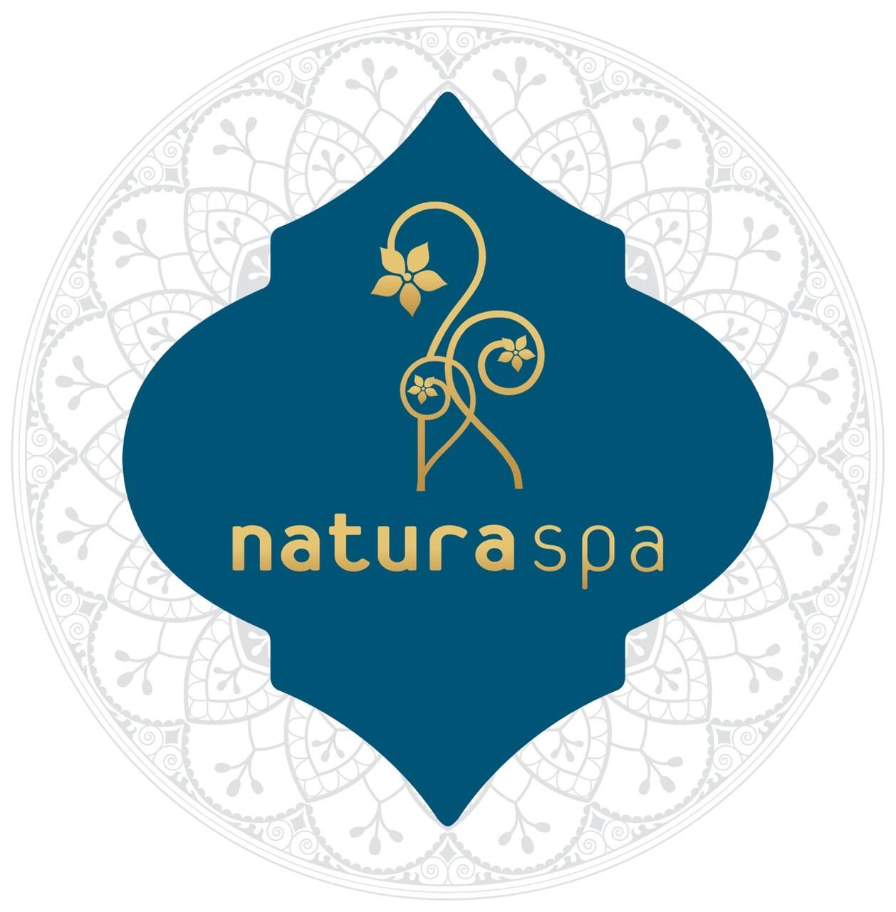 A blue and gold logo for natura spa