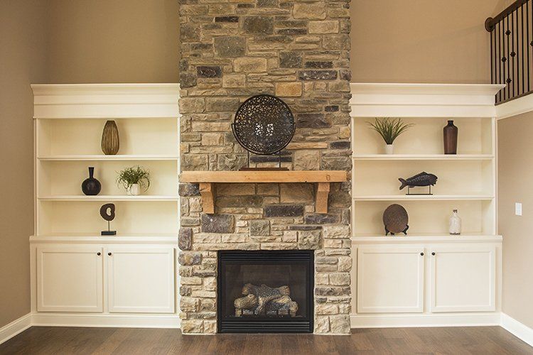 Fireplace Surrounded by Shelves by Hansman Custom Homes in Mid-MO