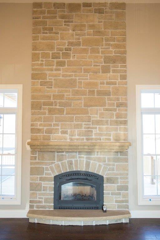 Tall Stone Fireplace by Hansman Custom Homes in Mid-MO