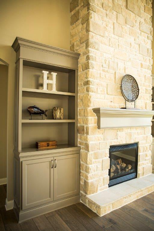 Side View of Shelves & Fireplace by Hansman Custom Homes in Mid-MO