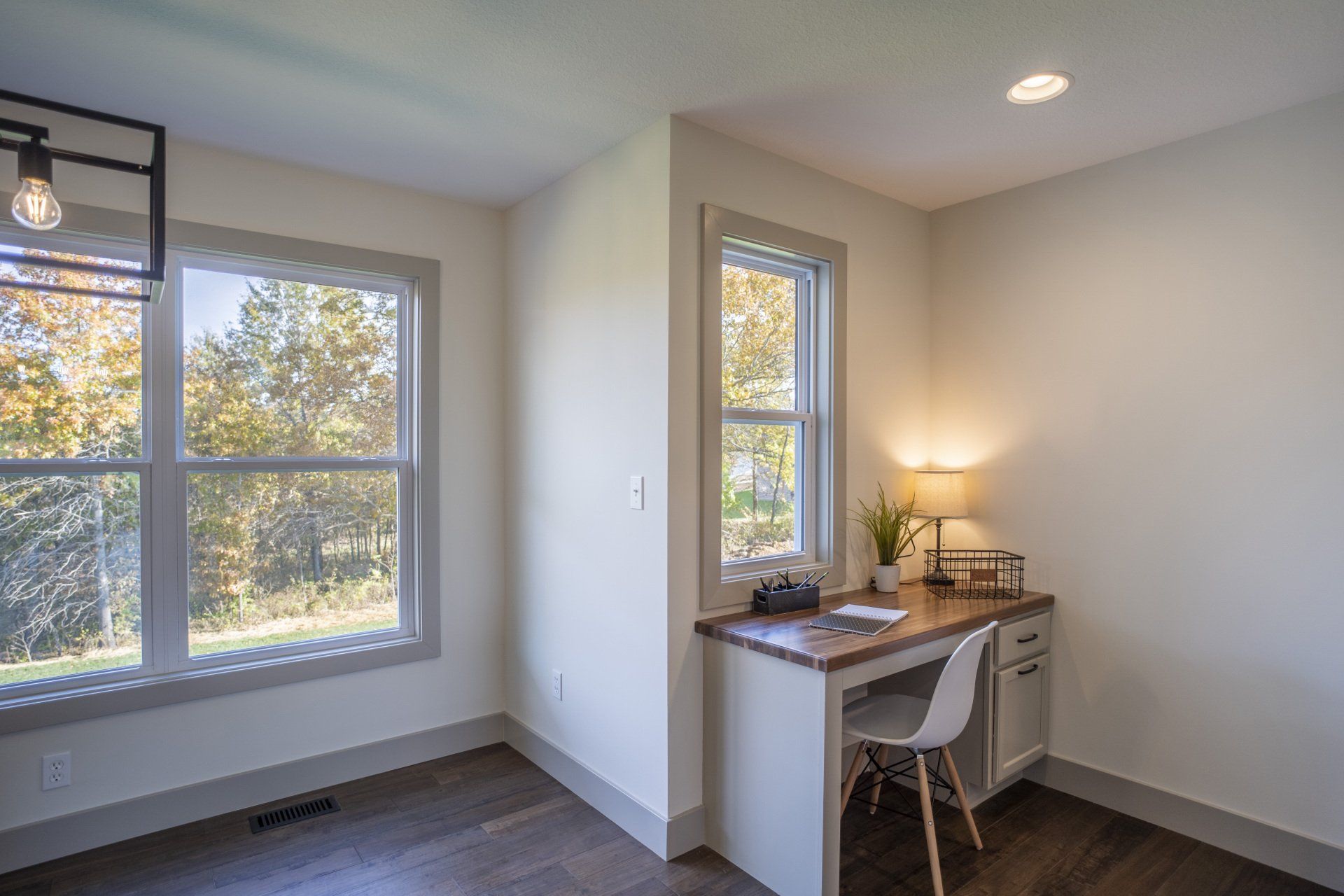 A Spacious Bedroom & Home Office by Hansman Custom Homes in Columbia, MO