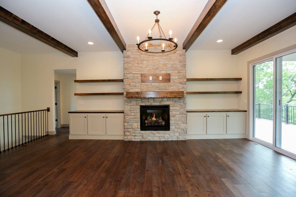 Wide Open Room & Fireplace by Hansman Custom Homes in Mid-MO