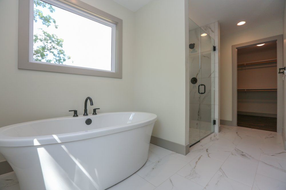 A Sleek, Clean Bathroom Created by Hansman Custom Homes in Mid-Missouri