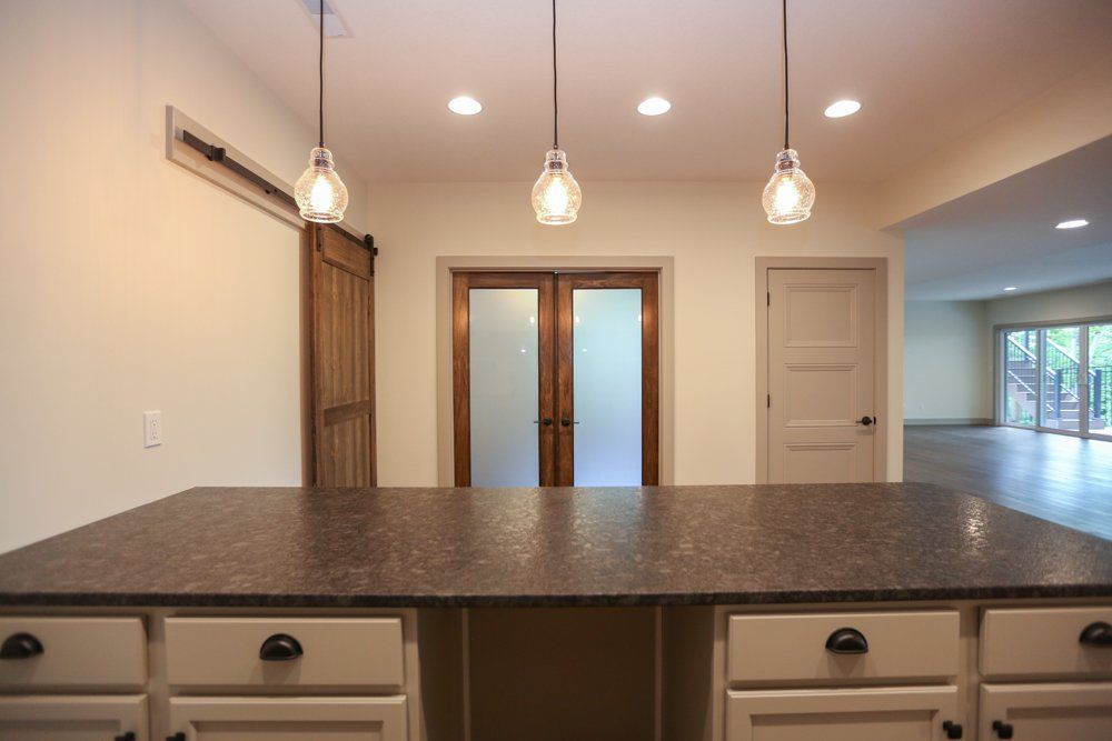 Behind the Countertop of a Wet Bar by Hansman Custom Homes in Mid-MO