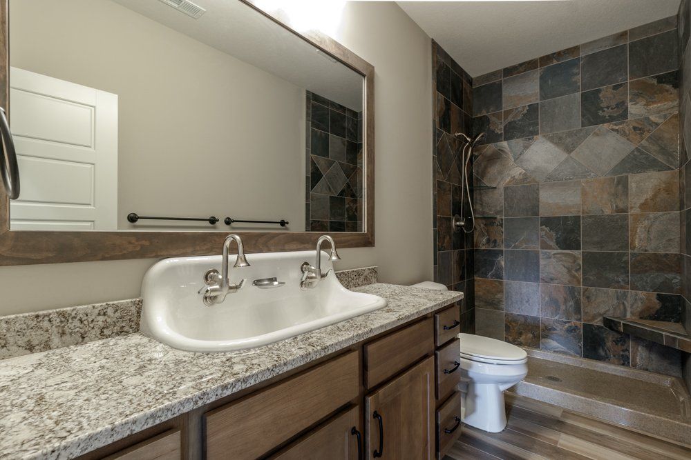 An Open Bathroom in the Mid-MO Area Designed by Hansman Custom Homes